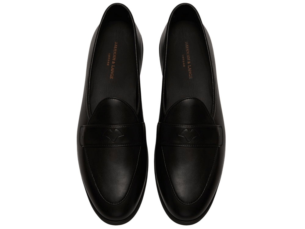 Stride Penny Loafers in Black Milled Calf Dark Sole