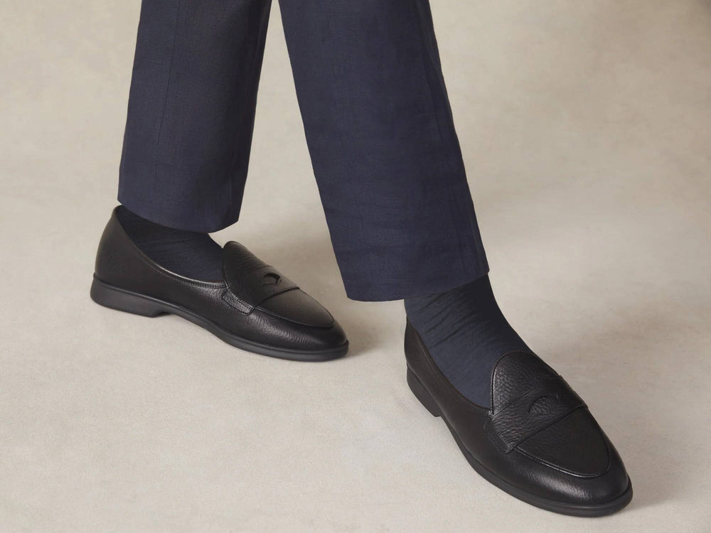 Stride Penny Loafers in Black Moorland Calf with Dark Sole