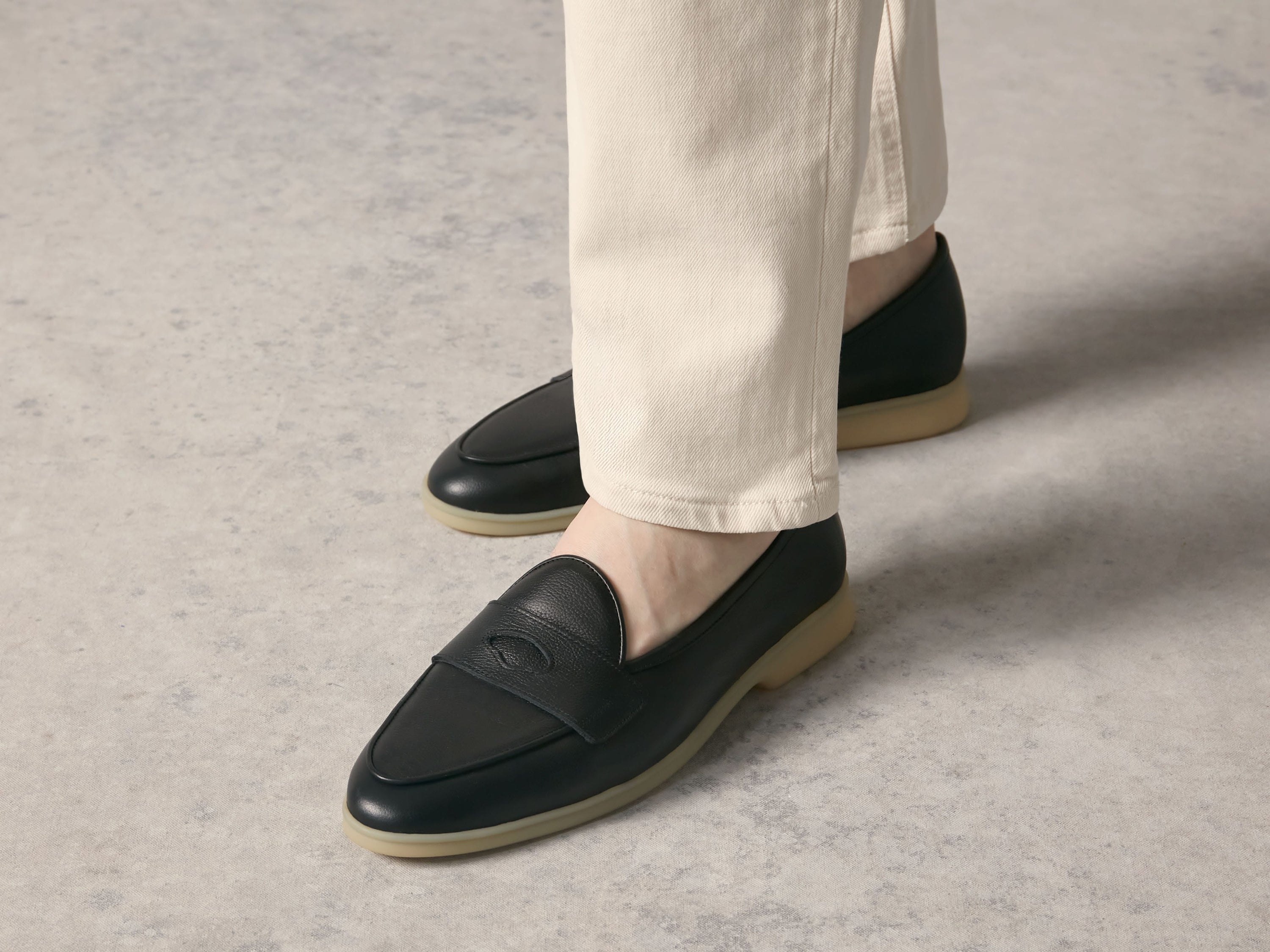 Stride Penny Loafers in Black Moorland Calf with Natural Sole
