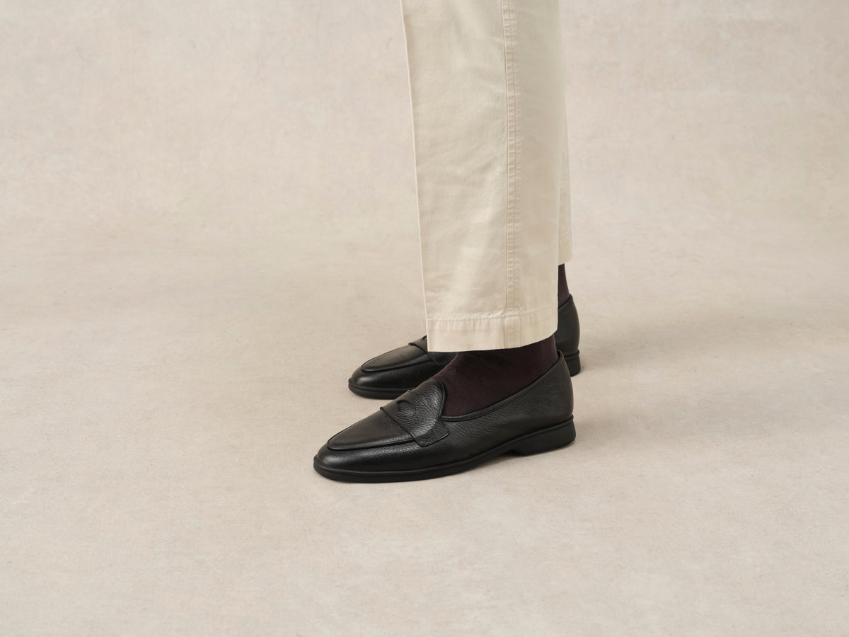 Stride Penny Loafers in Black Moorland Calf with Dark Sole