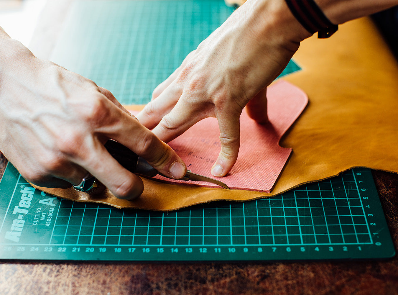 Each pair passes through more than a hundred steps of careful hands.