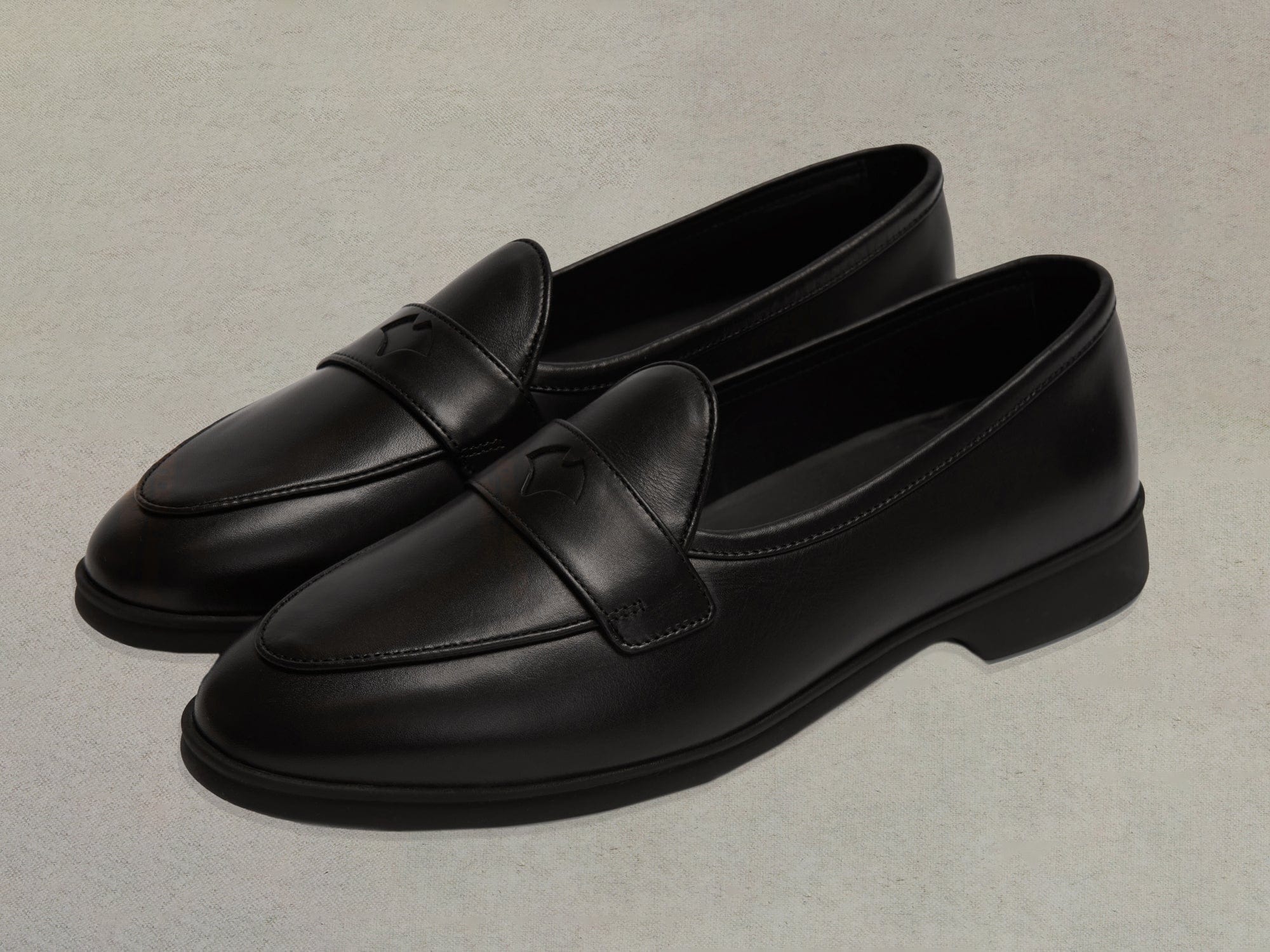 Stride Penny Loafers in Black Milled Calf