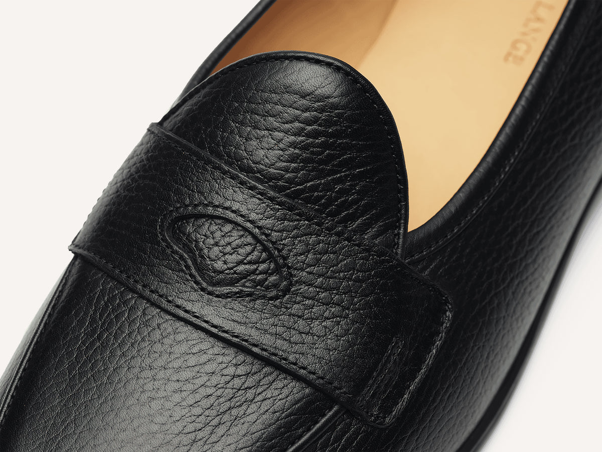 Stride Penny Loafers in Black Moorland Calf with Dark Sole